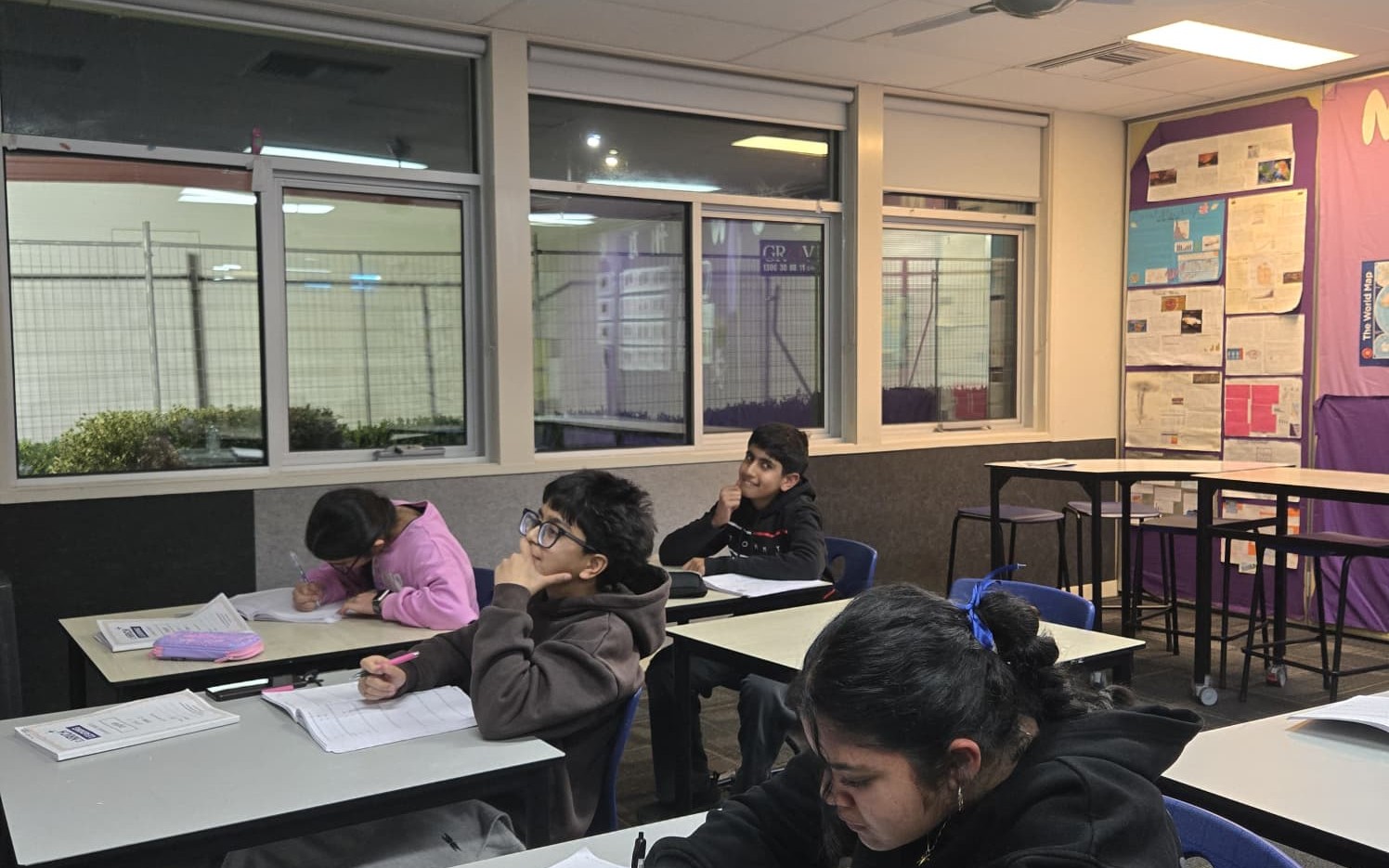 Students practising English and mathematics fundamentals